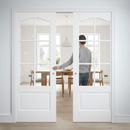 Premium Glazed Telescopic Pocket Door System with Wooden Jamb Kit, Adjustable Doorstop, and Anti-Warp Profile for Elegant Spaces